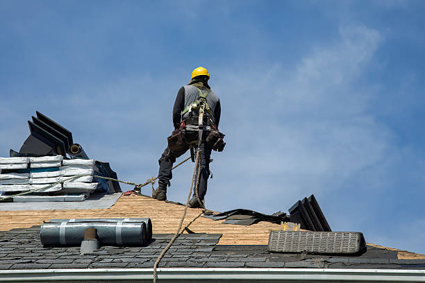 Professional Gutter Installation technician working in Arlington, WA